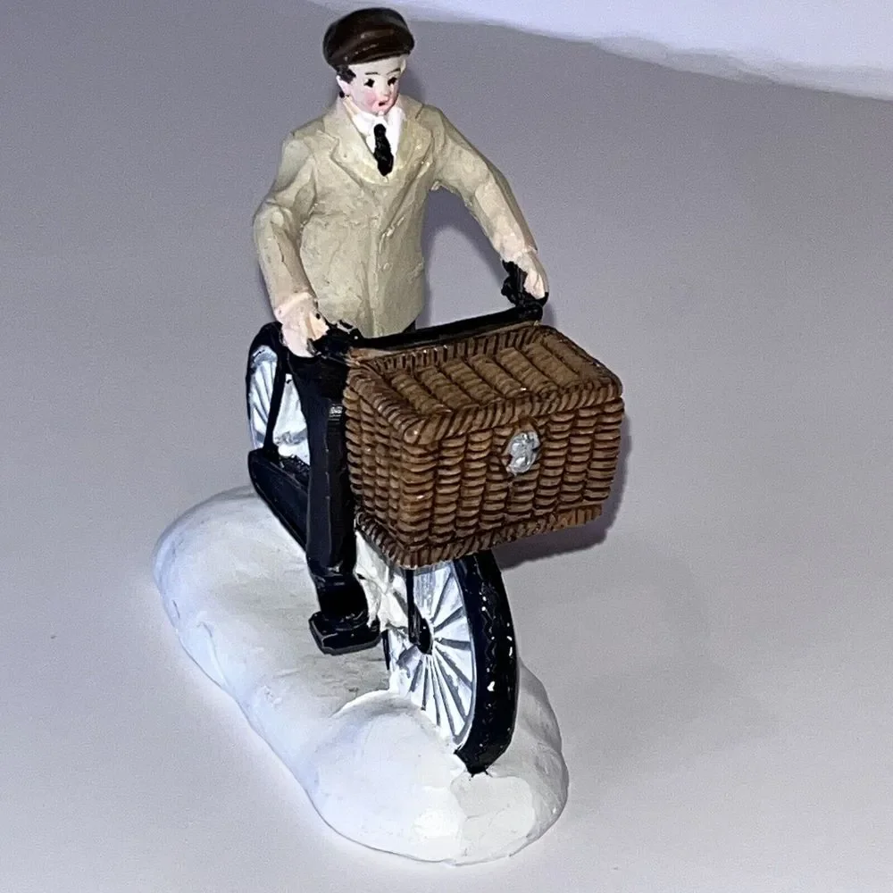 2 Christmas‎ Village Ceramic Figurines Man On Bicycle & Christmas In City Sign